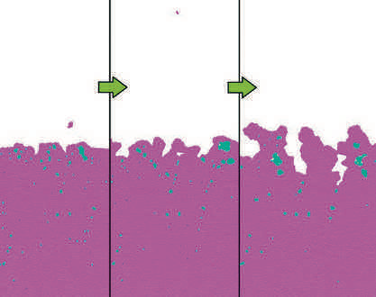 タングステンの繊維状ナノ構造（紫はタングステン原子、青はヘリウム原子を表している）